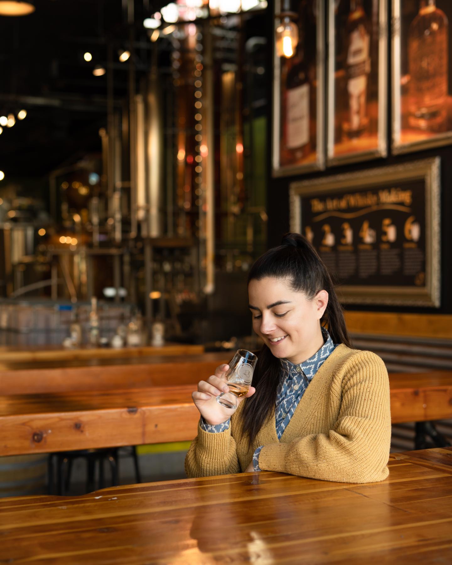 woman tasting a drink