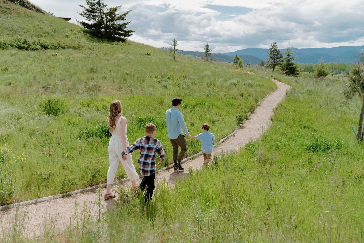 A family walking along a mountain trail