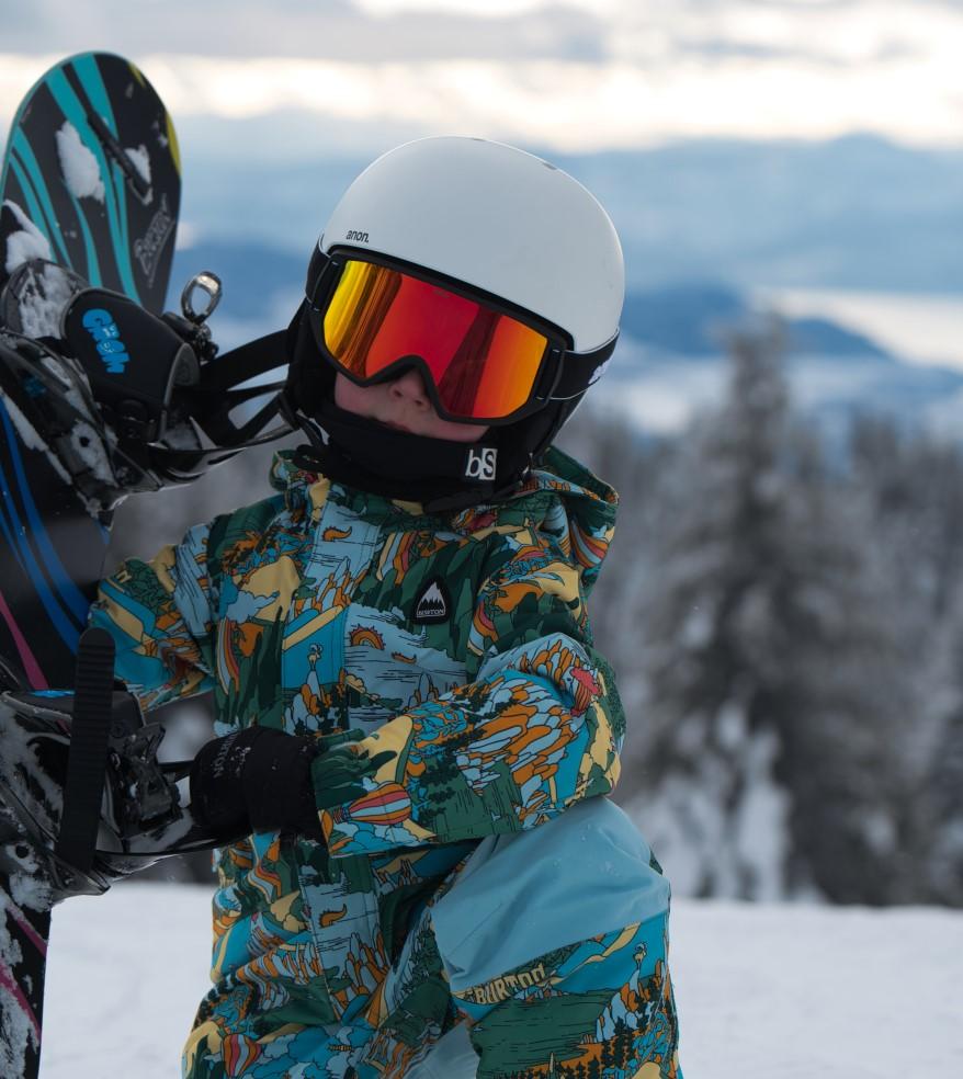 kid with snowboard