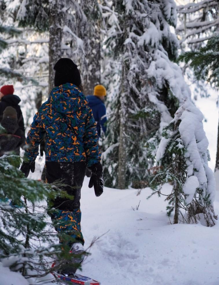 kid snowshoeing