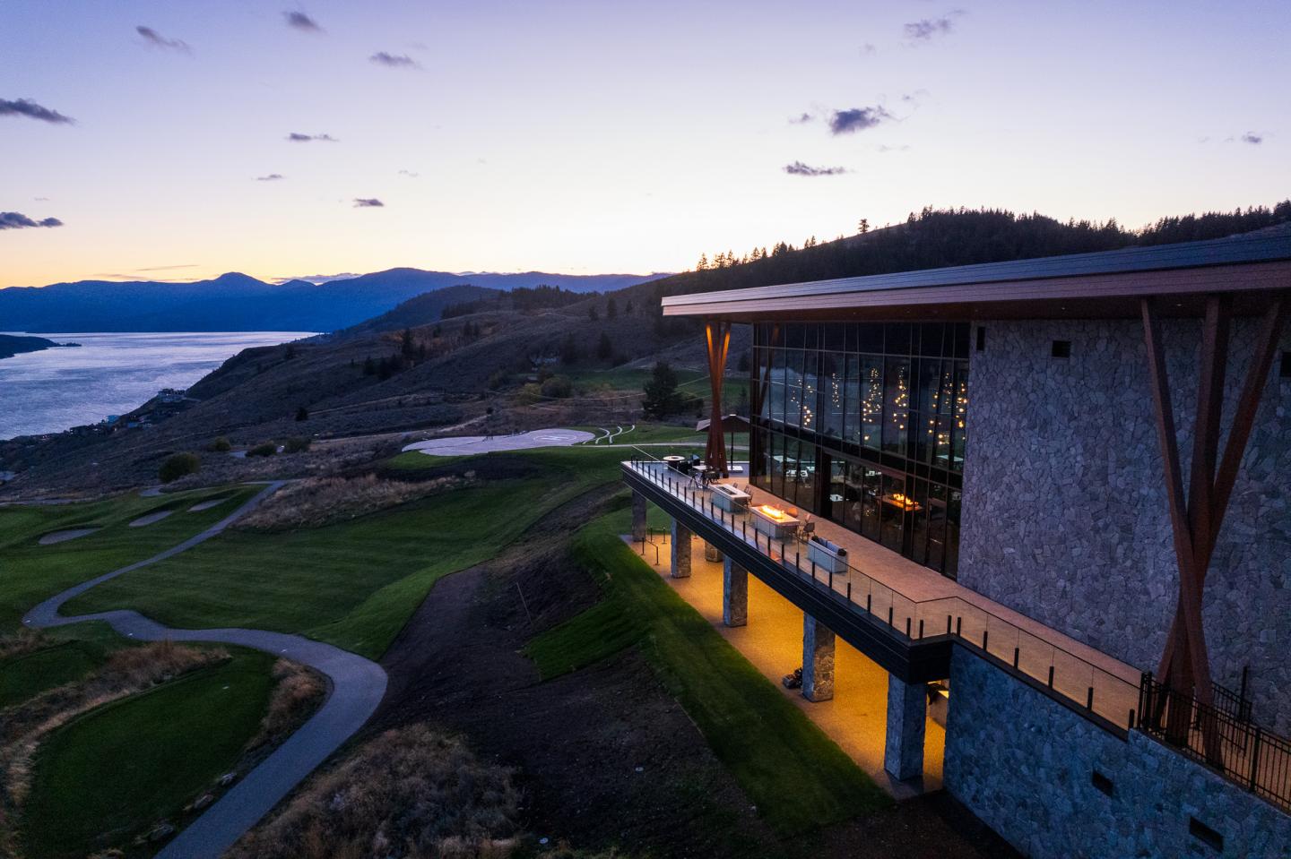 sunset overlooking okanagan lake from patio at the edge restaurant